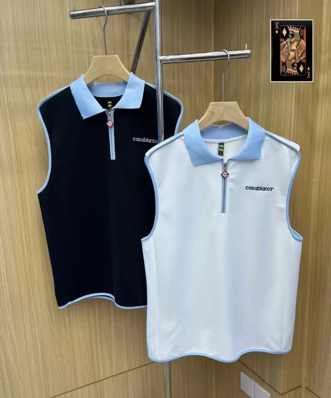 Sleeveless Quarter-Zip Polo Vests.